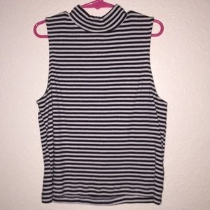 a white and blue striped tank top
